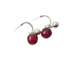 Elegant silver C-shaped cherry pendant earrings with glossy red translucent resin droplets