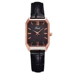 Vintage women's square quartz watch with black textured dial and rose gold octagonal case