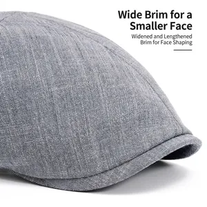 Béret gris élégant avec texture sergée et large bord pour une protection solaire optimale