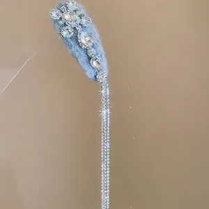Light blue flocked water drop hair clip with elegant silver diamond tassels and floral accents