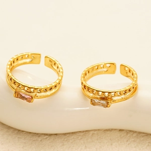 Gold hollow chain rings set with pink and white rectangular zircon gemstones