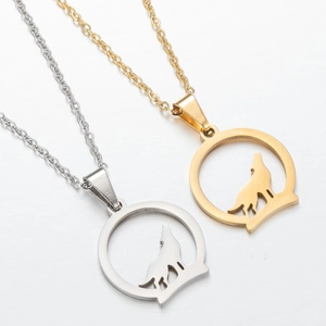Minimalist circular wolf howling silhouette pendant necklace in gold and silver metal