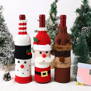 Knitted Christmas wine bottle covers featuring Santa, snowman, and reindeer festive designs