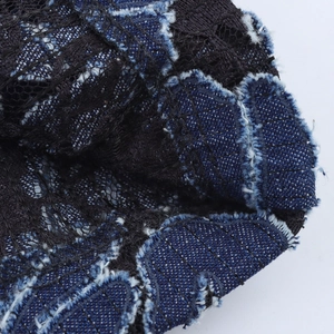 Vintage high waist straight trousers with blue denim patches and black lace embroidery