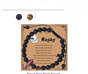 Detailed view of 8mm matte black and tiger eye beads rugby bracelet with info card