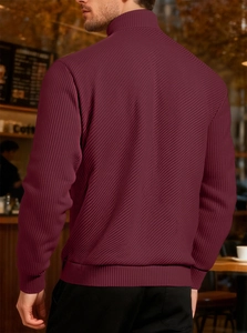 Detailed view of the dark burgundy corduroy texture on this men's high-neck sweatshirt