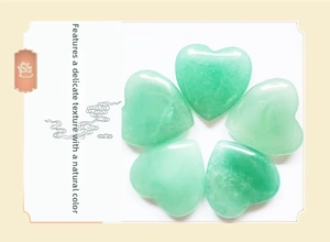 Detailed view of five polished heart-shaped green aventurine natural crystal stones