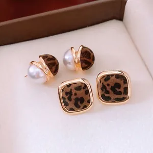 Vintage leopard flocking geometric stud earrings with gold accents and pearl details