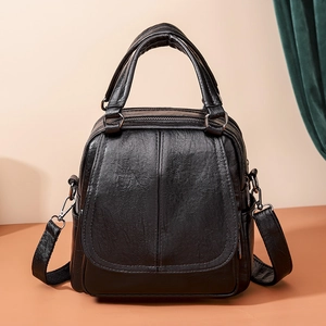 Mochila elegante de cuero negro granulado para mujer, convertible en bolso de mano y hombro