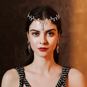 Silver bridal headpiece with crystal rhinestones and matching earrings for wedding parties