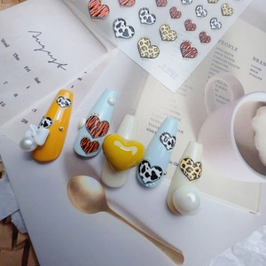 Japanese press-on nails set with 3D embossed hearts and stylish leopard patterns