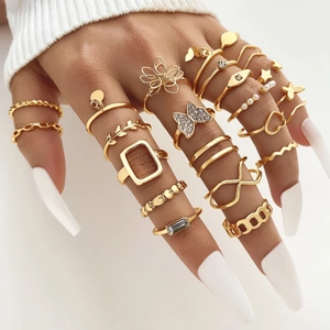 Bohemian gold ring set with butterfly, pearl, and rhinestone designs for women