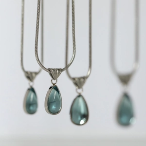 Teardrop blue ocean gemstone necklace with silver snake chain in 18K gold plated steel