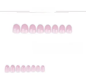 Detailed view of pink gradient press-on nails with classic French white tips and round shape