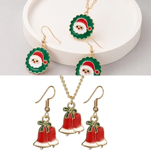 Christmas jewelry set featuring Santa and bells with colorful enamel in gold finish