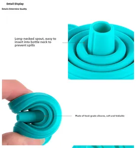 Macro shot of turquoise food-grade silicone foldable funnel with a long neck spout