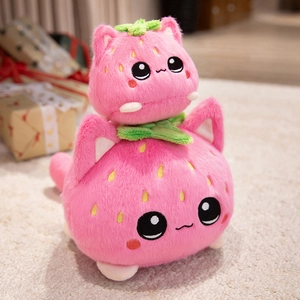 Pink strawberry cat plush toy set with embroidery details on a soft white carpet