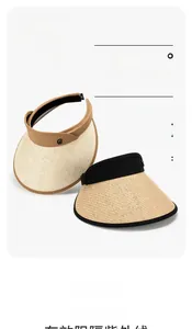 Close-up of breathable straw open-top sun hats in camel and black trims with UPF50+ protection