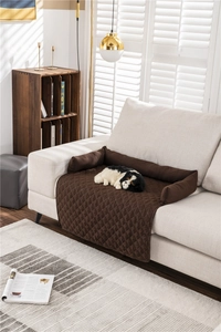 Close-up of dark brown quilted waterproof pet sofa protector with diamond stitching