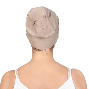 Rear view of khaki pleated turban cap for women featuring smooth elastic fabric detail