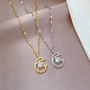 Luxurious titanium steel dolphin pendant necklace with dazzling crystals in gold and silver