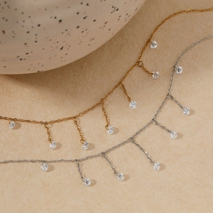 Elegant stainless steel tassel necklace with shimmering cubic zirconia in gold and silver