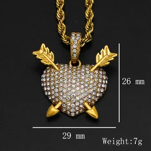 Gold plated iced out heart and arrow pendant necklace with sparkling white crystals