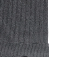 Macro view of dark grey ribbed knit fabric showing detailed stitching and soft texture