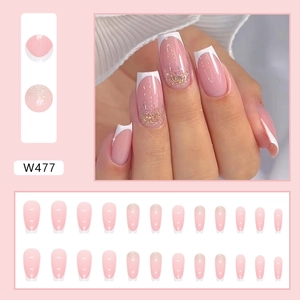 Pink and white French tip ballerina press-on nails with golden glitter accents