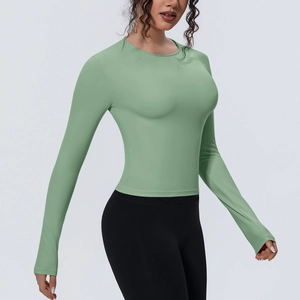 T-shirt de yoga à manches longues vert herbe ajusté en tissu élastique mat de sport