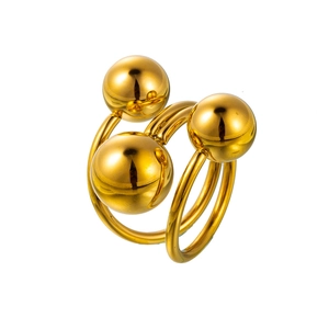 Detailed view of a gold-plated stainless steel spiral ring featuring three spherical beads