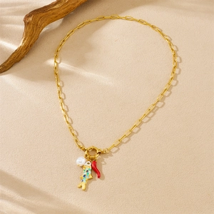 Fashion gold necklace with enamel fish, pearl, and red chili pendants on spring clasp