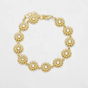 18k gold plated daisy flower bracelet with white cubic zirconia and lobster clasp