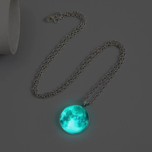 Luminous moon pendant necklace with glowing celestial glass orb on silver chain