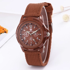Detailed close-up of brown military-style watch with Gemius ARMY dial and nylon strap