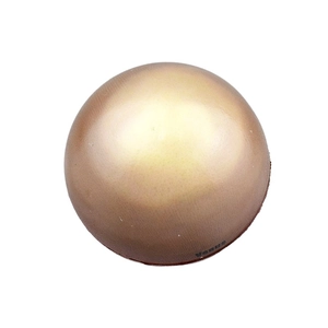 Detail shot of golden Venus stress ball with realistic foam texture and black lettering