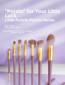 Vertical macro view of professional 7-piece purple makeup brush set with golden ferrules