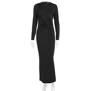 Detail view of waist ruched design on black slim fit high neck long sleeve dress