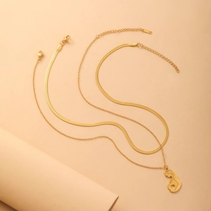 Double-layered gold-plated stainless steel necklace featuring snake chain and pregnant mom pendant