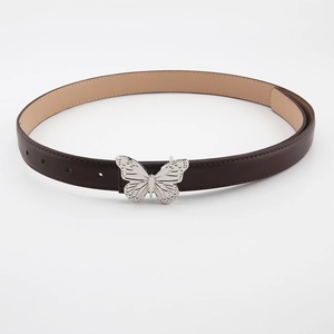 Close-up of brown faux leather belt featuring a silver butterfly buckle on white background