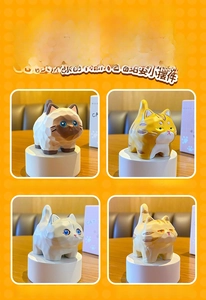 Detailed set of four wood-style resin cat figurines with faceted carving textures