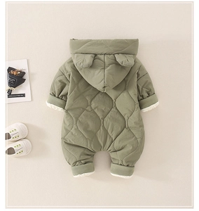 Close-up of olive green quilted baby romper with warm hood and cute bear ears