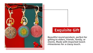 Detailed macro view of rhinestone ball keychains with golden metal bell and bead charms