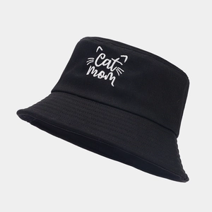 Black cotton bucket hat with white Cat Mom embroidery showing a side 45-degree angle