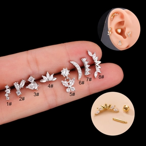 Surgical steel stud earring set with zircons in butterfly and crown shapes for piercing