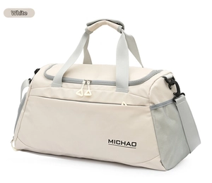 Detail view of the large capacity travel duffel bag showing durable fabric and mesh side pocket.