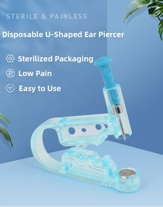Detail view of a sterile U-shaped disposable ear piercer with medical grade needle