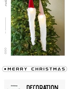 Close-up of glowing plush Christmas gnome ornaments with white beards and warm LED lights