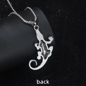 Silver crocodile pendant necklace with ripple chain shown from the back view