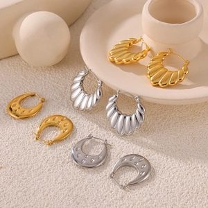 French vintage croissant twist earrings in gold and silver titanium steel metal finish